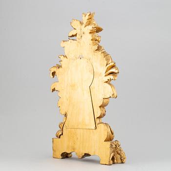 A rococo style table clock, 19th Century.