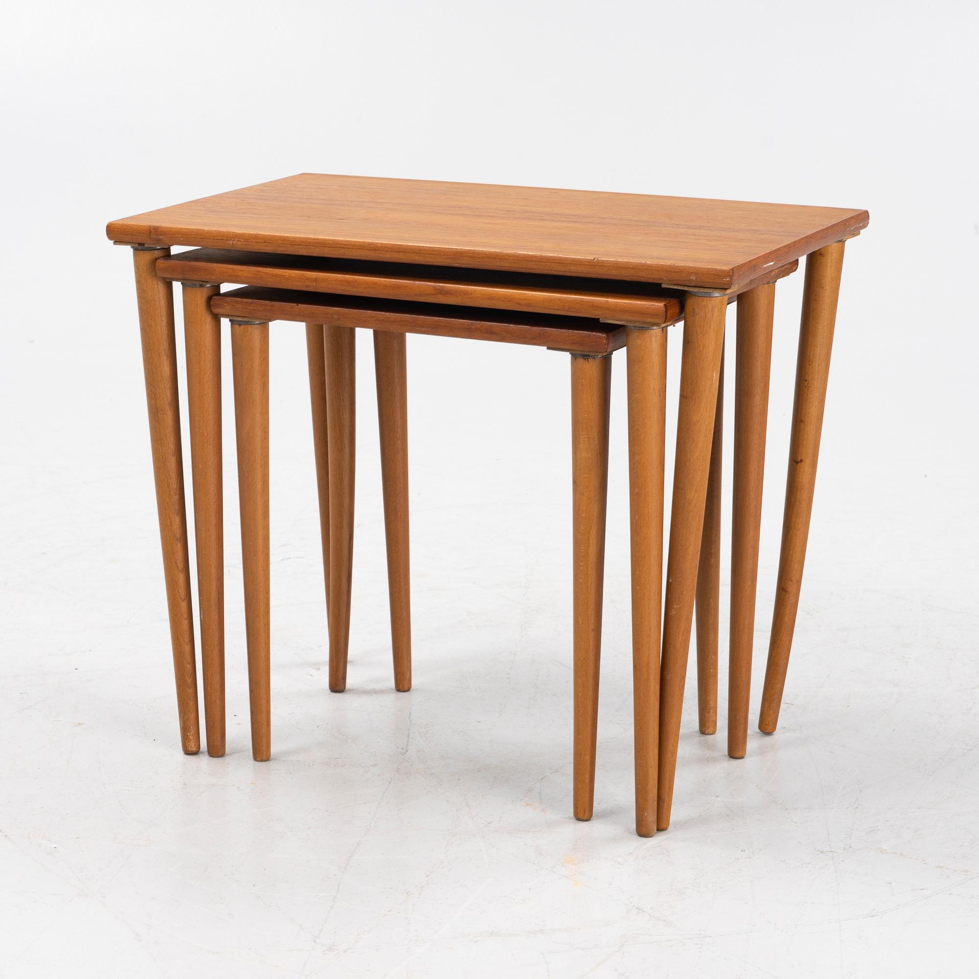 A teak and oak nesting table, 1950s.