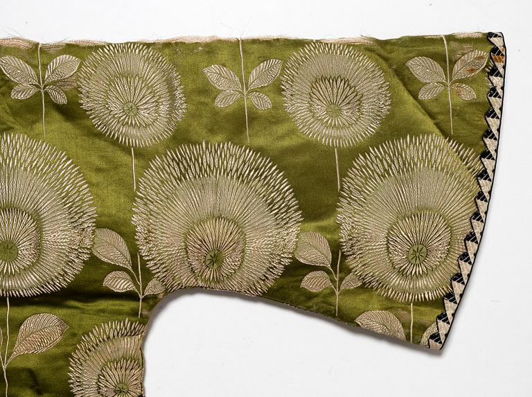 A Japanese silk brocade and fur childrens jacket, Meiji (1868-1912).