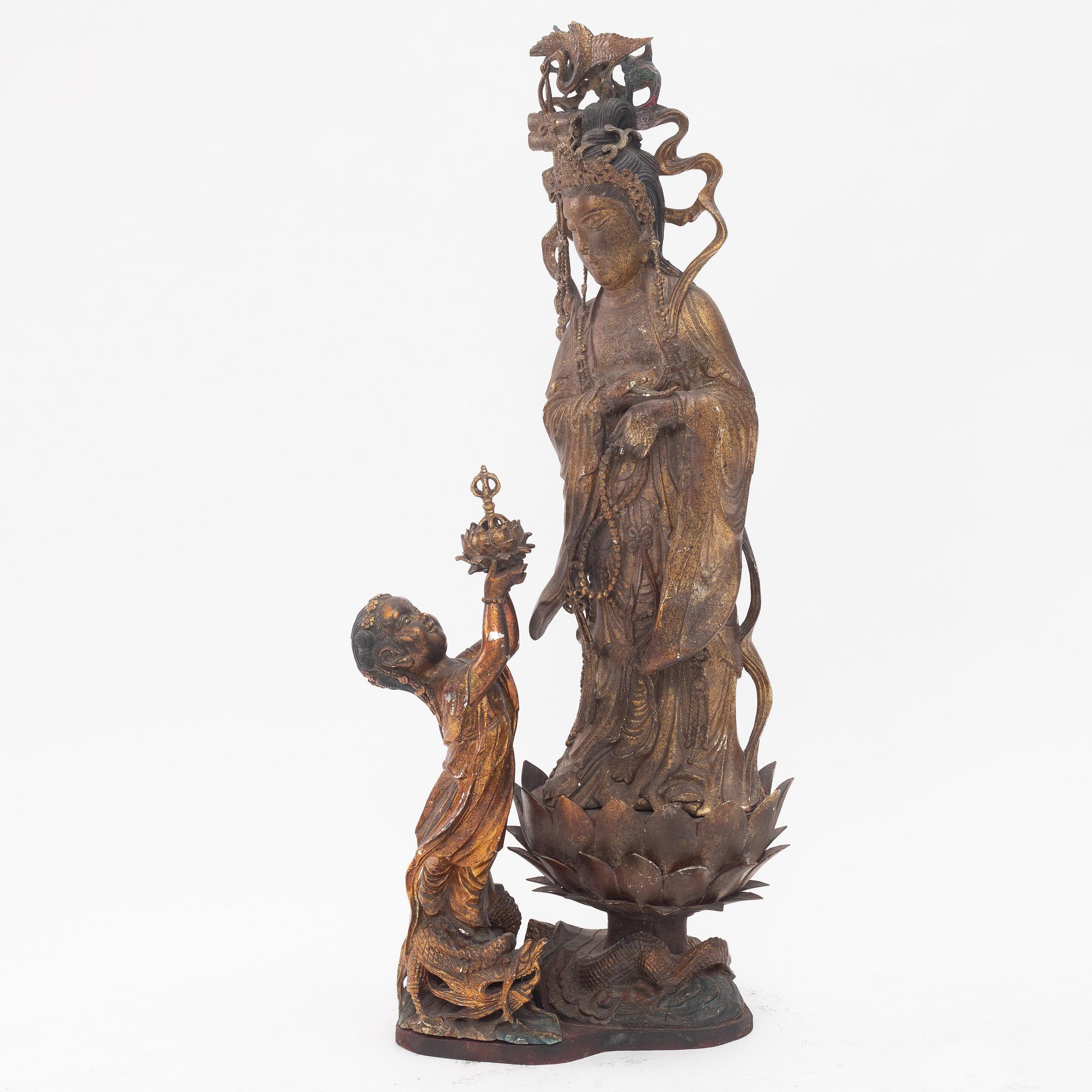 A large gilt and lacquer sculpture group, three parts, 20th century.