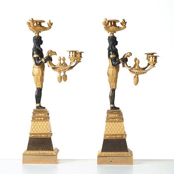 A pair of Empire three-light candelabra, circa 1810.