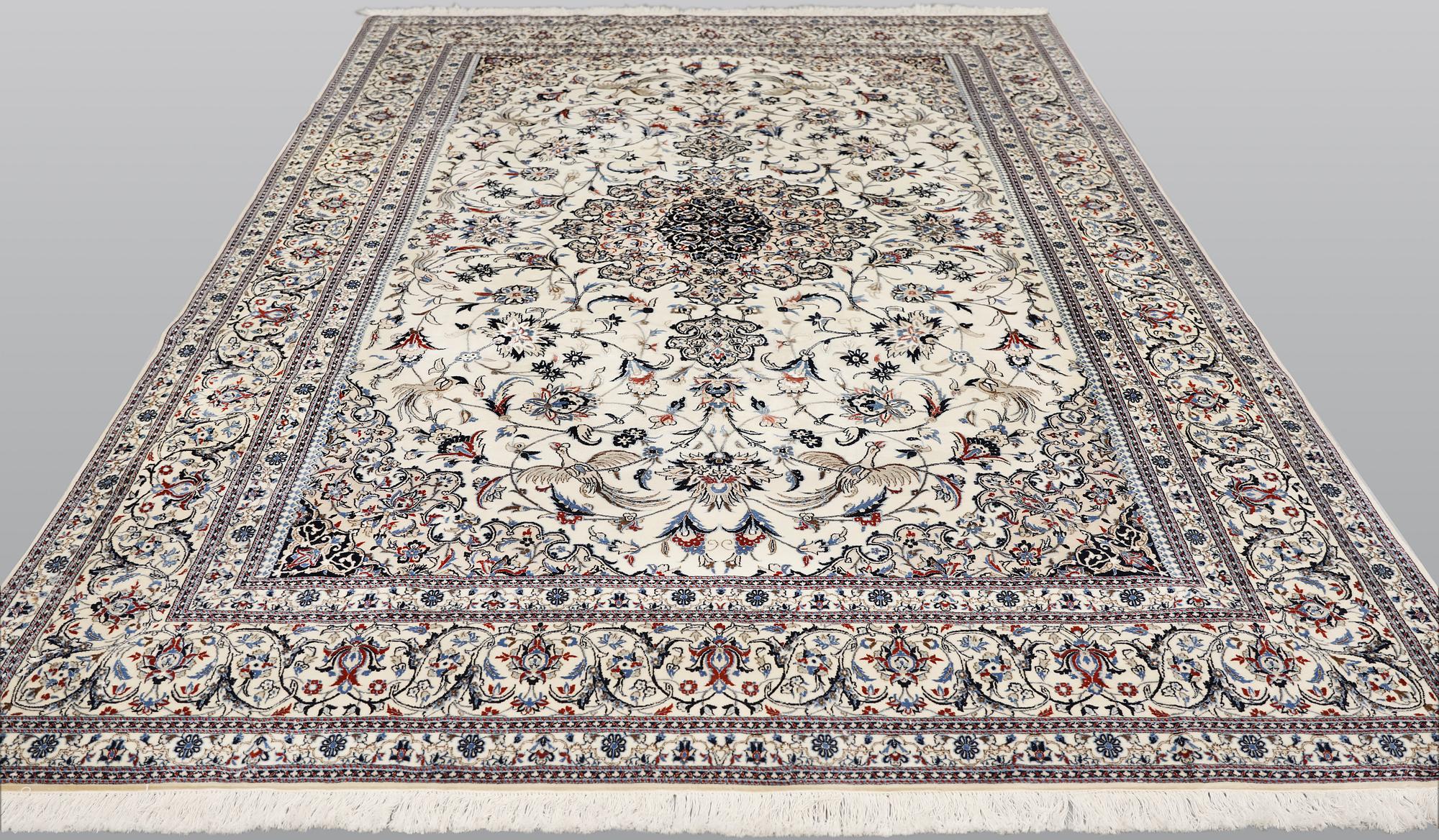 A part silk Nain carpet, so-called 6LAA, approx. 324 x 218 cm.
