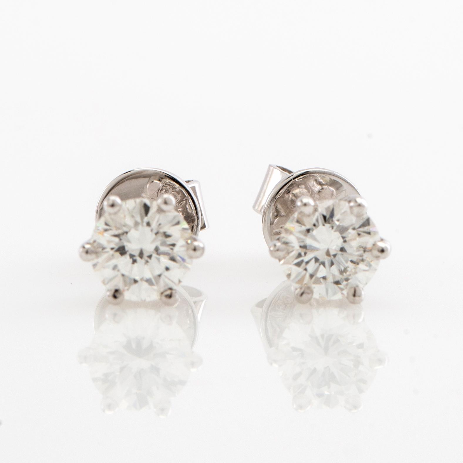 Earrings, a pair, 18K white gold with brilliant-cut diamonds.