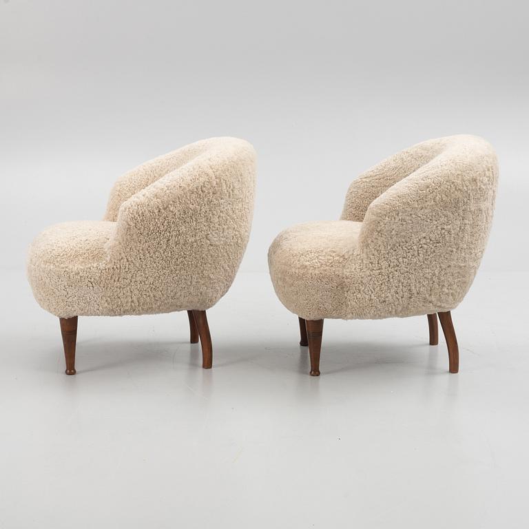 A pair of Swedish Modern armchairs, mid 20th century.