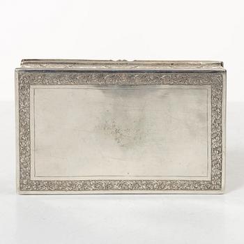 A Persian silver cigarett box, first half of the 20th century. Total weight 266 grams.