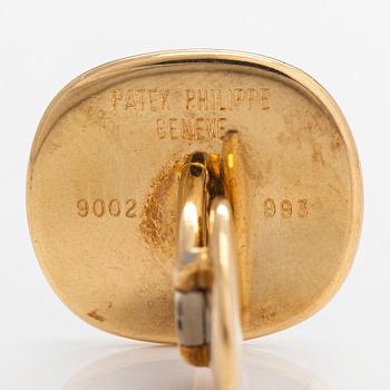 Patek Philippe, a pair of 18K gold 'Ellipse' cufflinks.