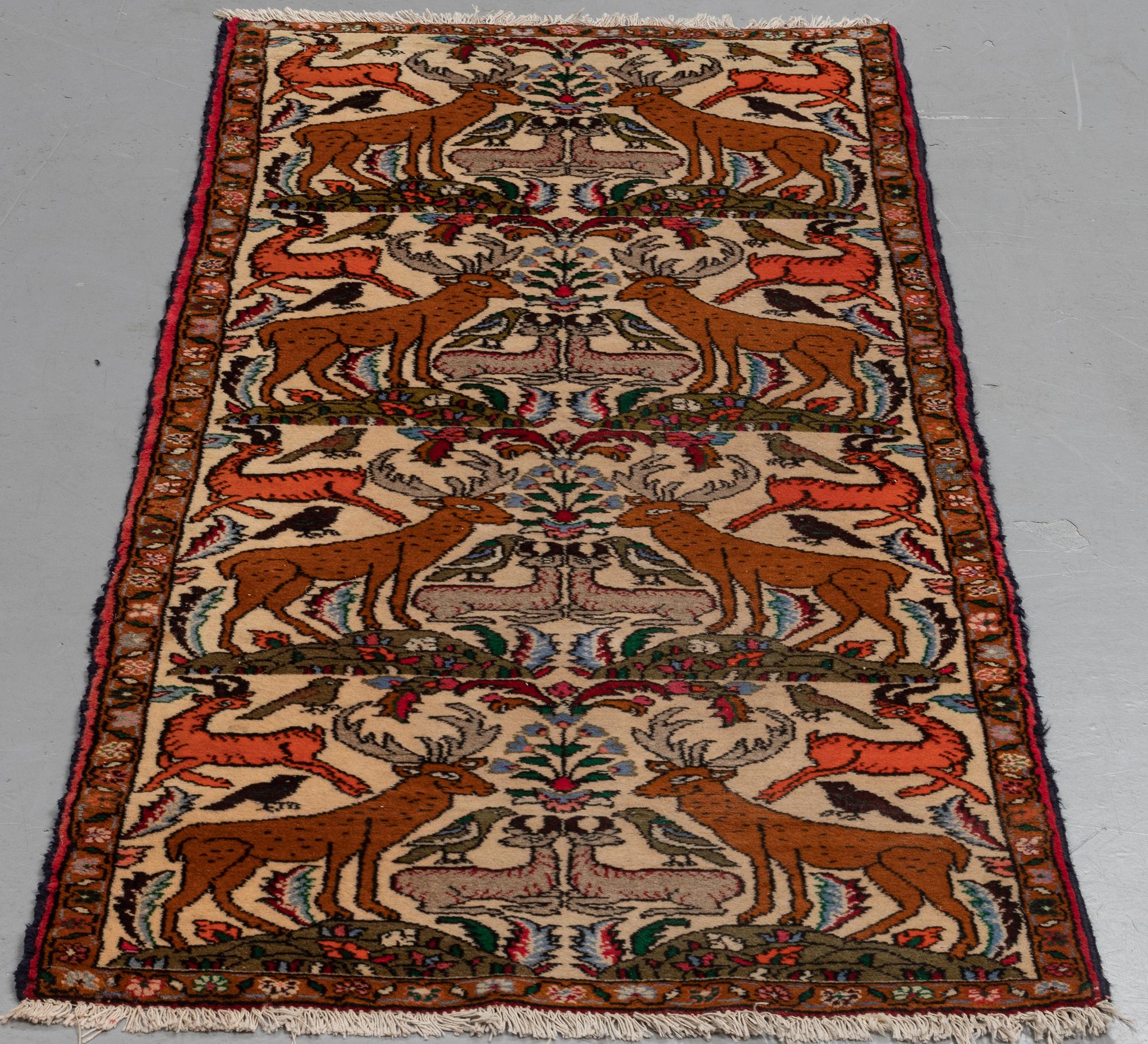 A rug, Old Persian figural, ca 190 x 82 cm.