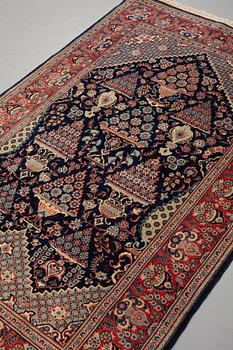 A rug, semi-antique, Kashan, ca 206,5 x 134,5 cm.