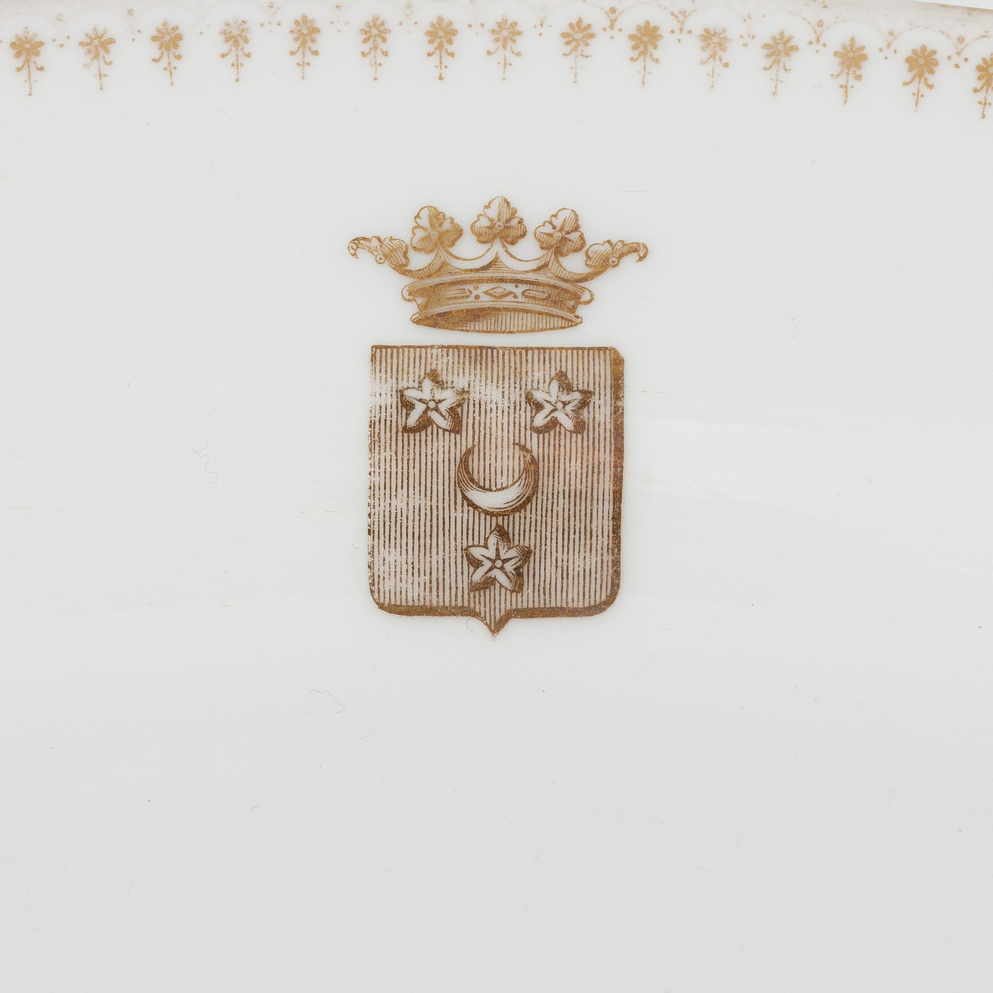 A 82 piece porcelin dinner service, France. With the Hamilton family coat of arms.