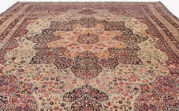 An antique Kerman Laver carpet, c. 586 x 385 cm.