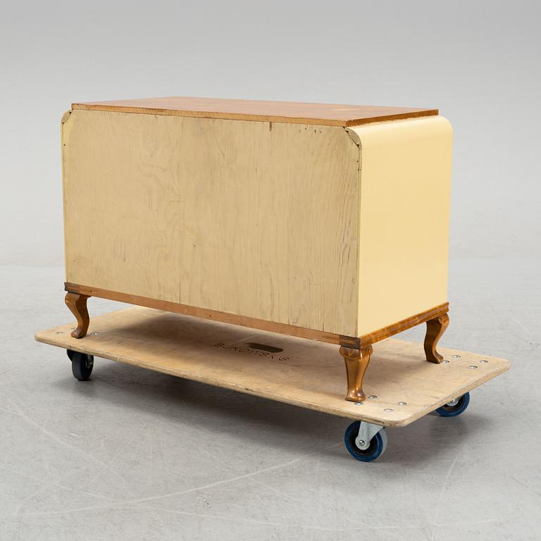 An elm veneeded chest of drawers, 1940's.