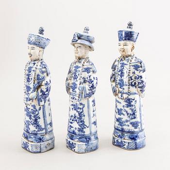 A set of three Chinese porcelain figurines.