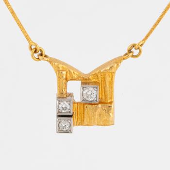 A Björn Weckström 18K gold necklace with brilliant-cut diamonds.