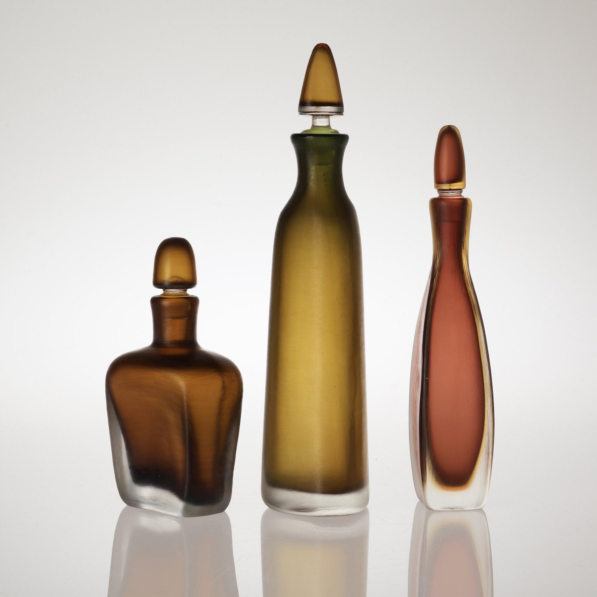 Three Paolo Venini 'Inciso' bottles, Venini, Murano, Italy, 1950's.
