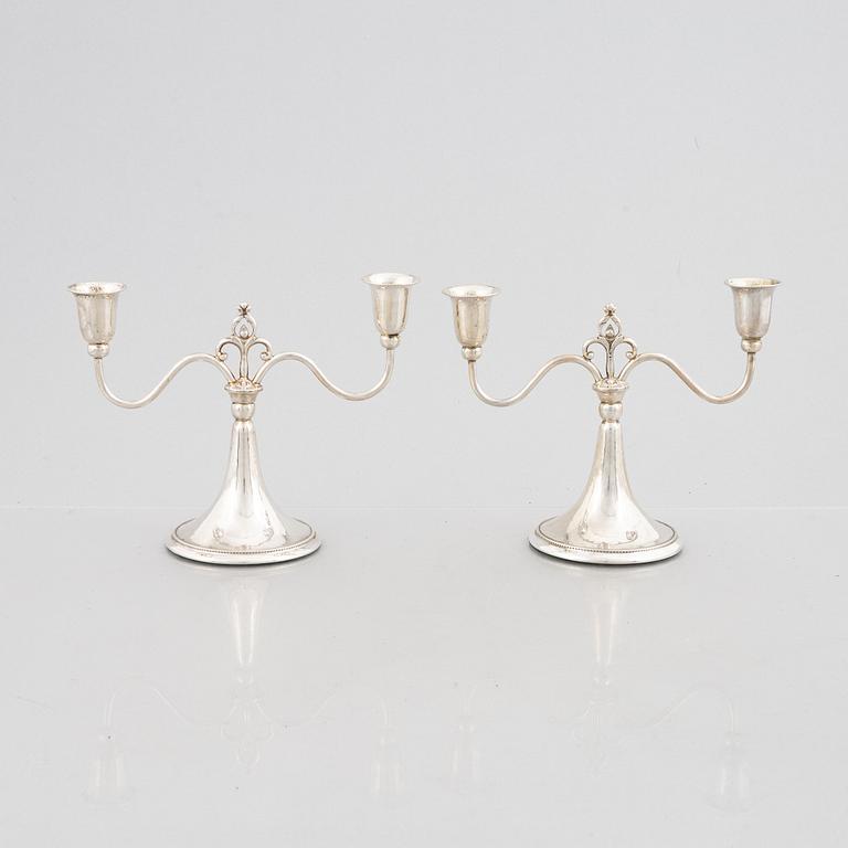 A Pair of Swedish Grace Silver Candelabras, mark of K Anderson, Stockholm 1930.