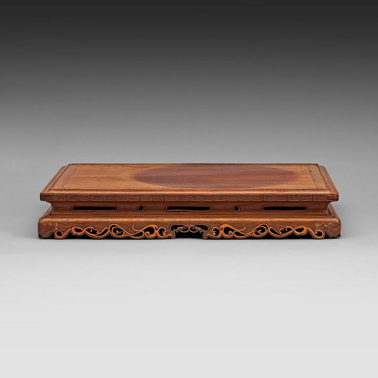 A hardwood stand, Qing dynasty, late 19th century.