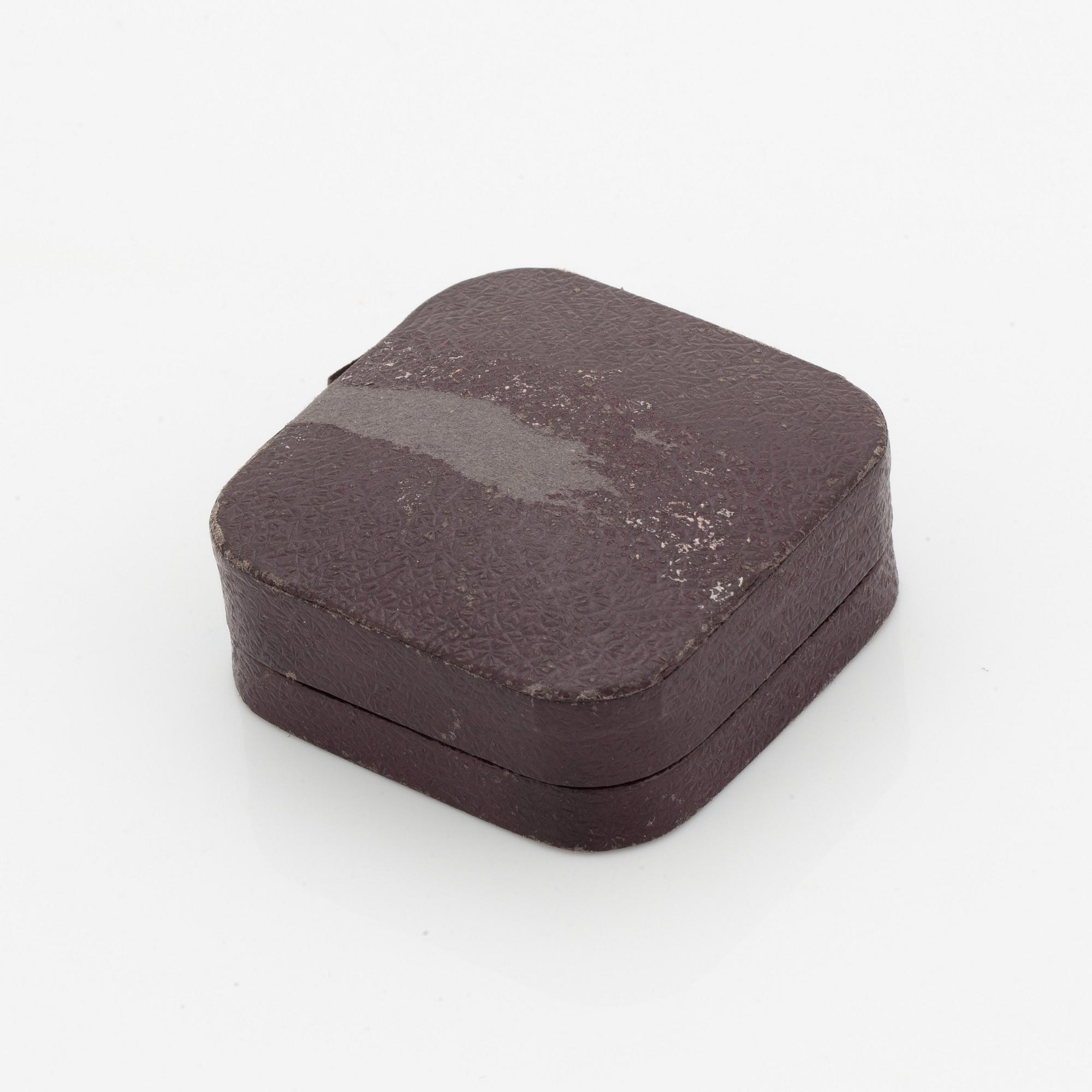 A heliodor brooch set with old- and rose-cut diamonds.