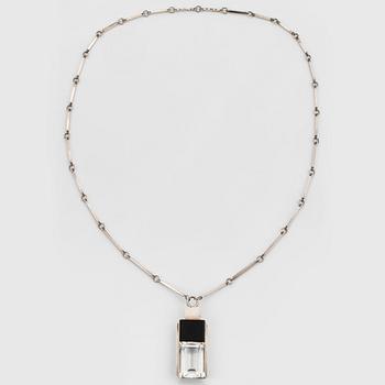 Wiwen Nilsson, a sterling silver, rock crystal and onyx pendant with chain, Lund Sweden 1937.