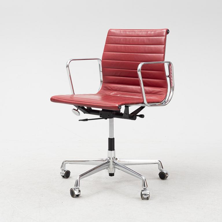 Charles & Ray Eames, a chrome swivel chair 'EA 118', Vitra.
