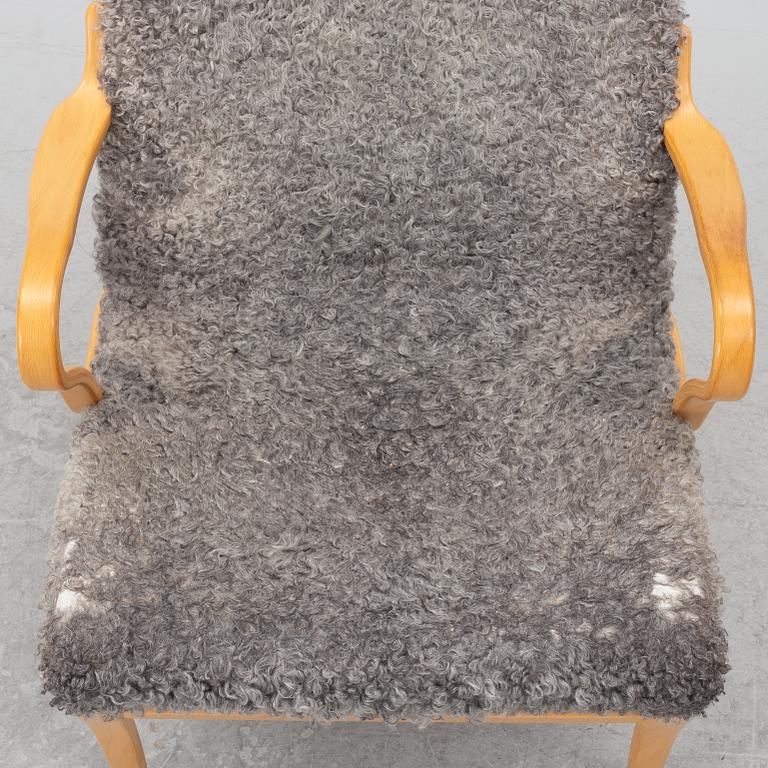 Bruno Mathsson, Armchair with footstool, "Miranda", Bruno Mathsson International, Värnamo, 2001.