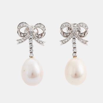 405A. A pair of 18K gold and cultured pearl earrings set with round brilliant-cut diamonds.