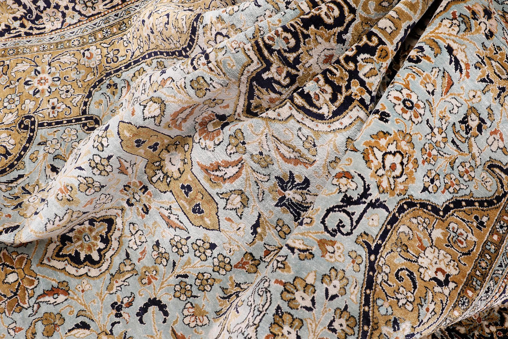 A carpet, silk Qum, ca 203 x 134 cm.