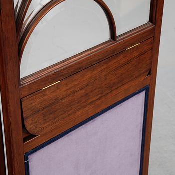 An early 20th century folding screen.