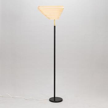 Alvar Aalto, an 'Angel's Wing' floor lamp. Manufactured by Valaistustyö.