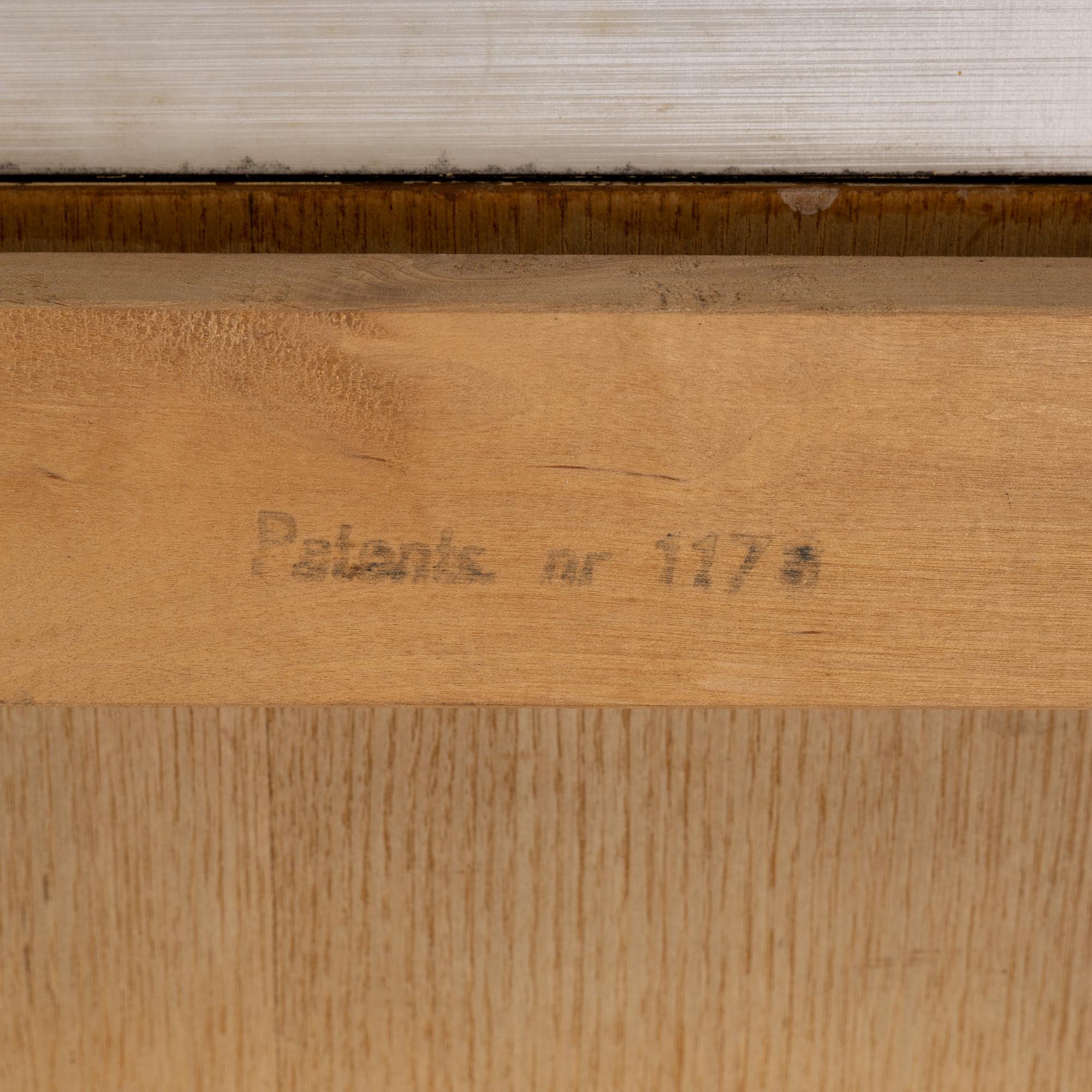 A teak veneered 'Expandette' coffee table, AB S Ljungqvists Möbelfabrik, Habo, 1950's.