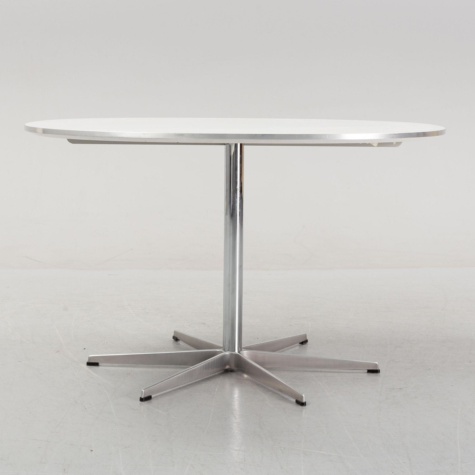Arne Jacobsen, Bruno Mathsson & Piet Hein, a 'Supercircular' dining table from Fritz Hansen, designed 1968.