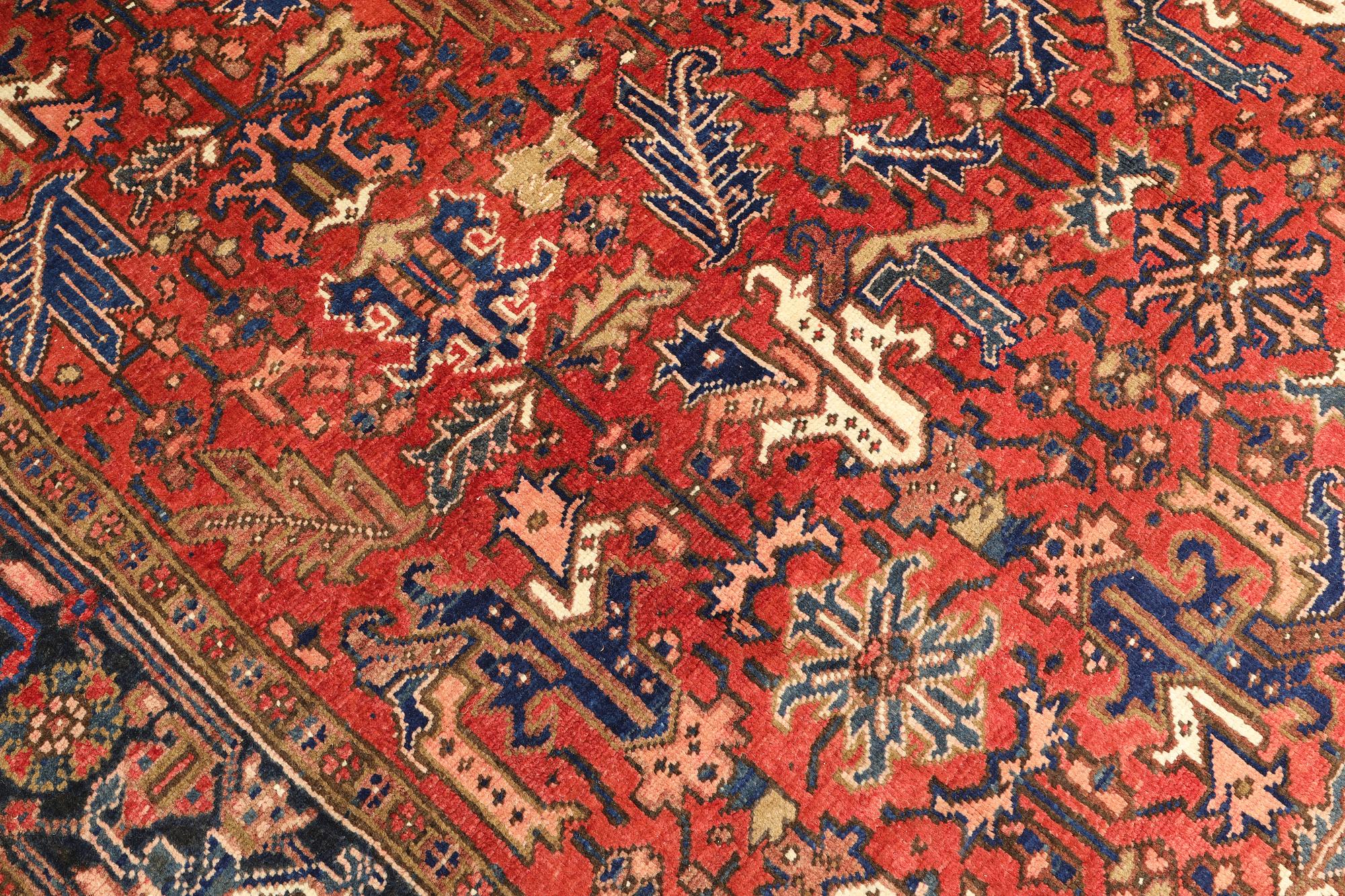 A semi-antique Heris rug, c. 287 x 230 cm.