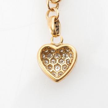 Cartier, Armband av 18K guld med runda briljantslipade diamanter.