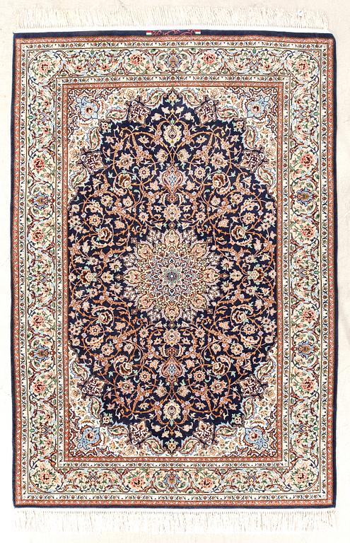 An old isfahan carpet signed part silk approx 223x146 cm.