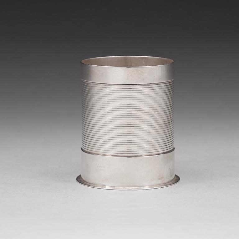 Sigvard Bernadotte, A Sigvard Bernadotte sterling bottle holder (for beer bottle), Georg Jensen, Copenhagen 1925-32.