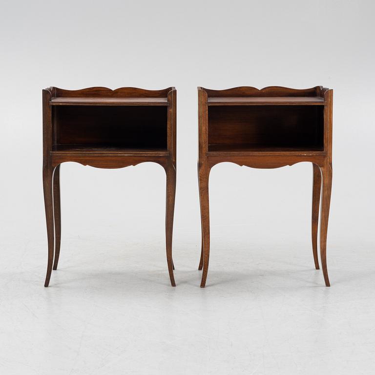 A pair of rococo style bedside tables, mid 20th Century.