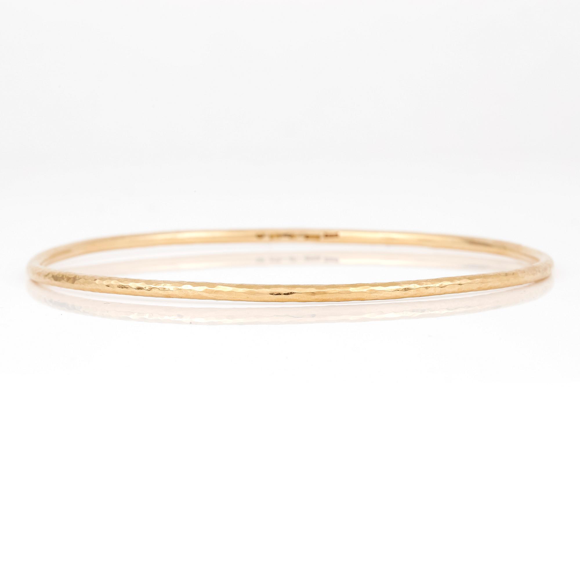 ARMRING, C G Hallbergs, Stockholm, 1923. 18K guld.