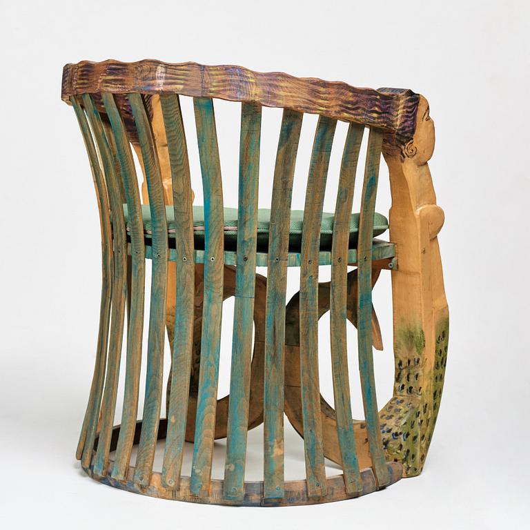 Gérard Rigot, a sculptured and signed armchair, late 20th century.