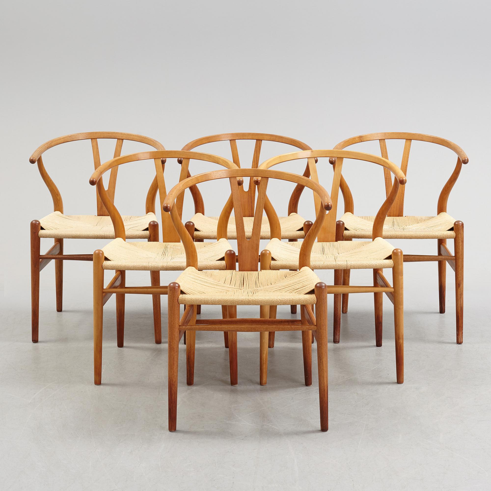 A set of four + two armchairs 'Y-chair' by Hans J Wegner, Carl Hansen & Son, Denmark.