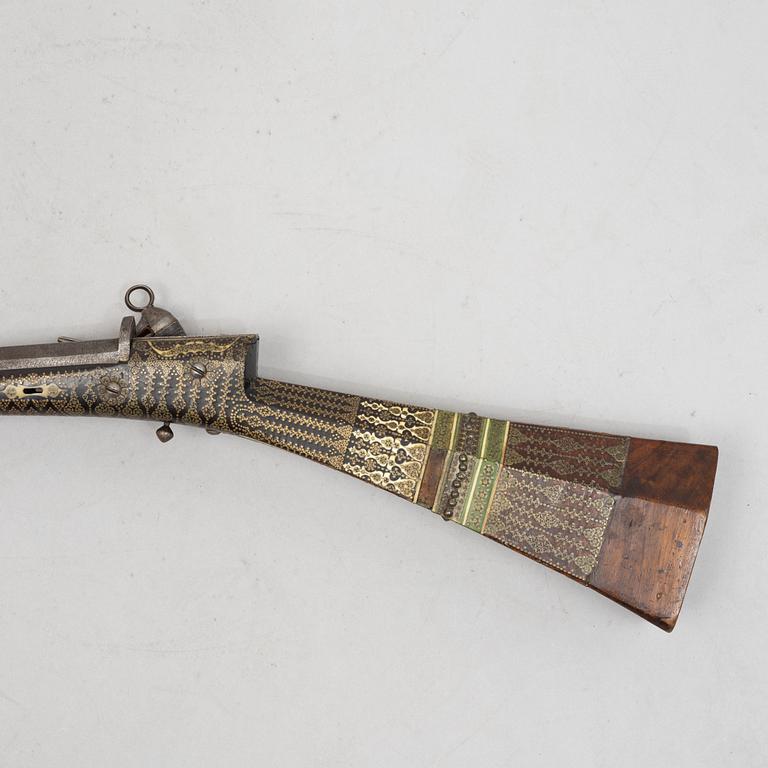 A Persian snaphaunce rifle, 18th century.