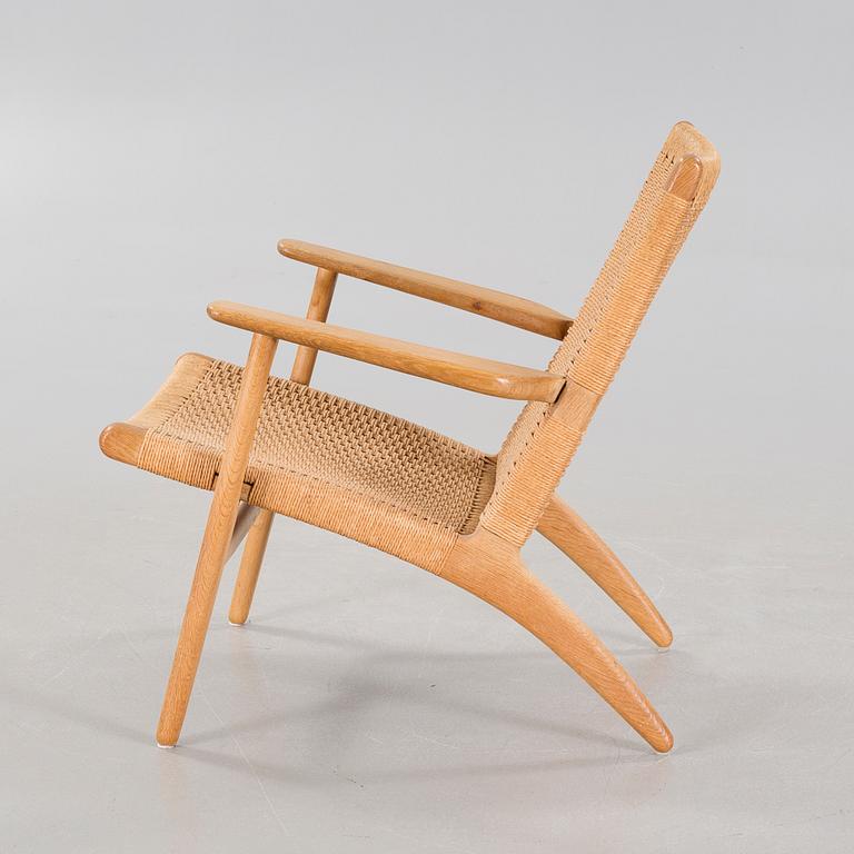 A lounge chair by Hans J Wegner, model "CH-25", for Carl Hansen & Son, Denmark, second half of the 20th century.