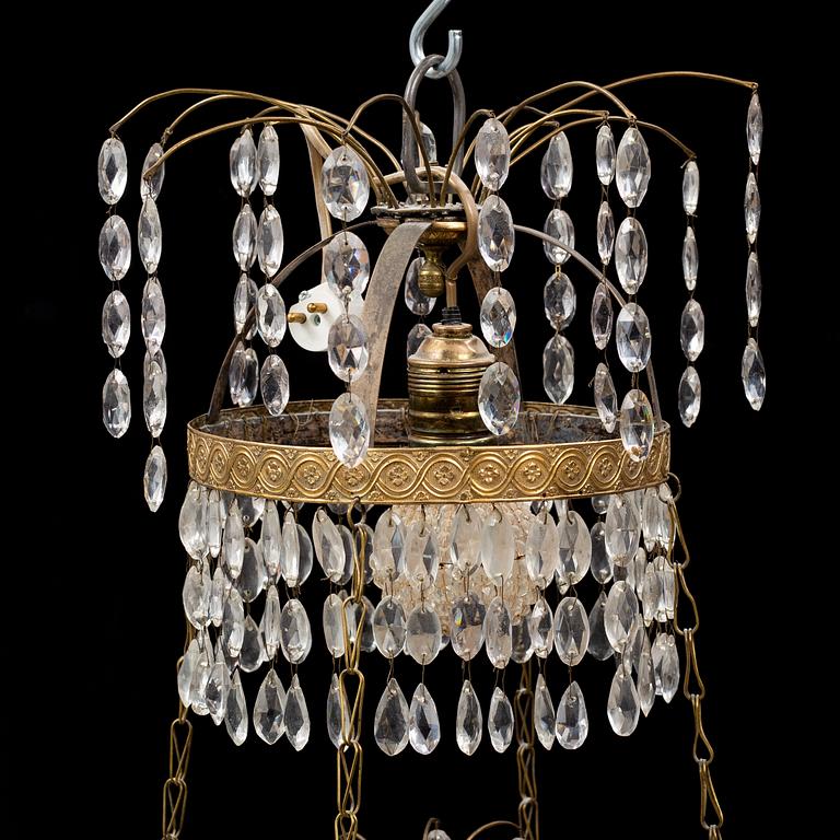 A gustavian style chandelier, circa 1900.