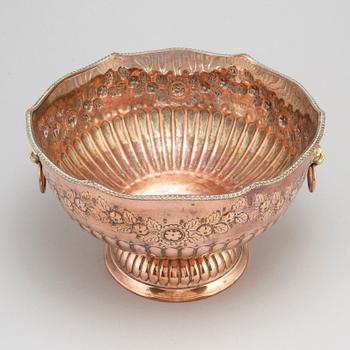 A 20th century champagne cooler.