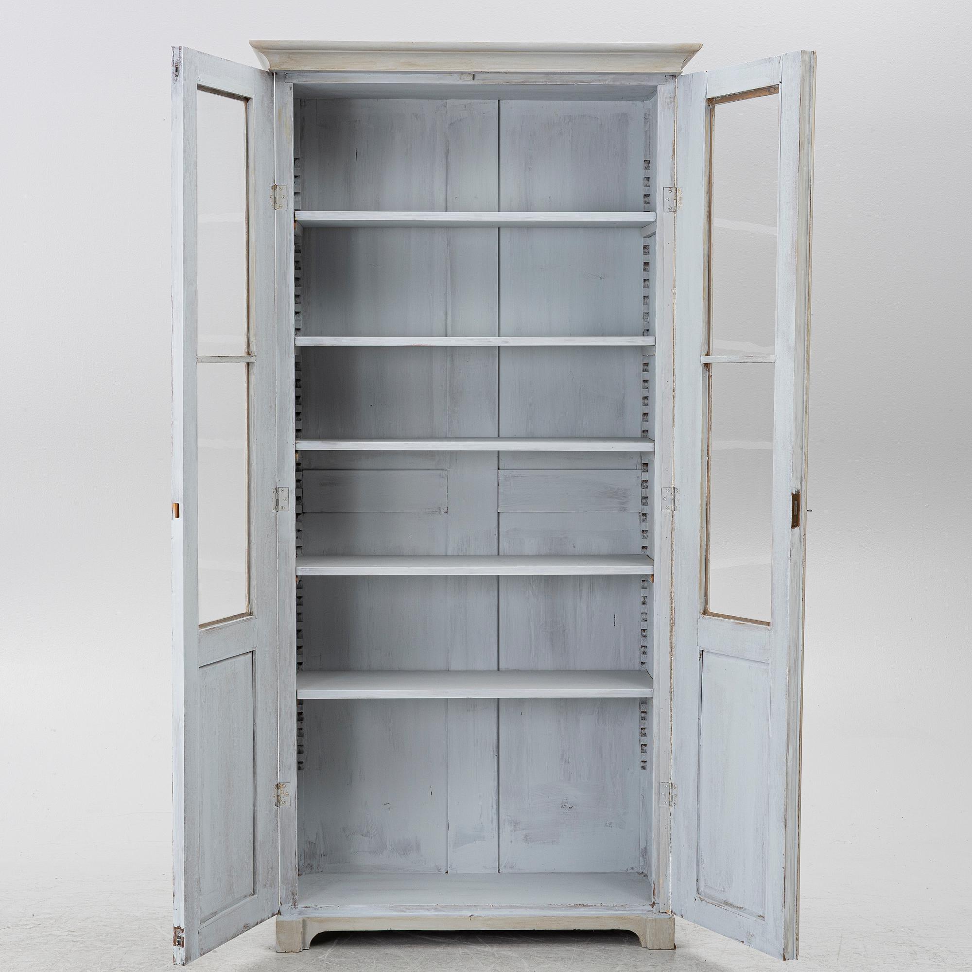 Display cabinet, circa 1900.