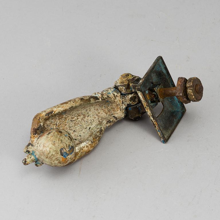 A 19th century brass door knocker.