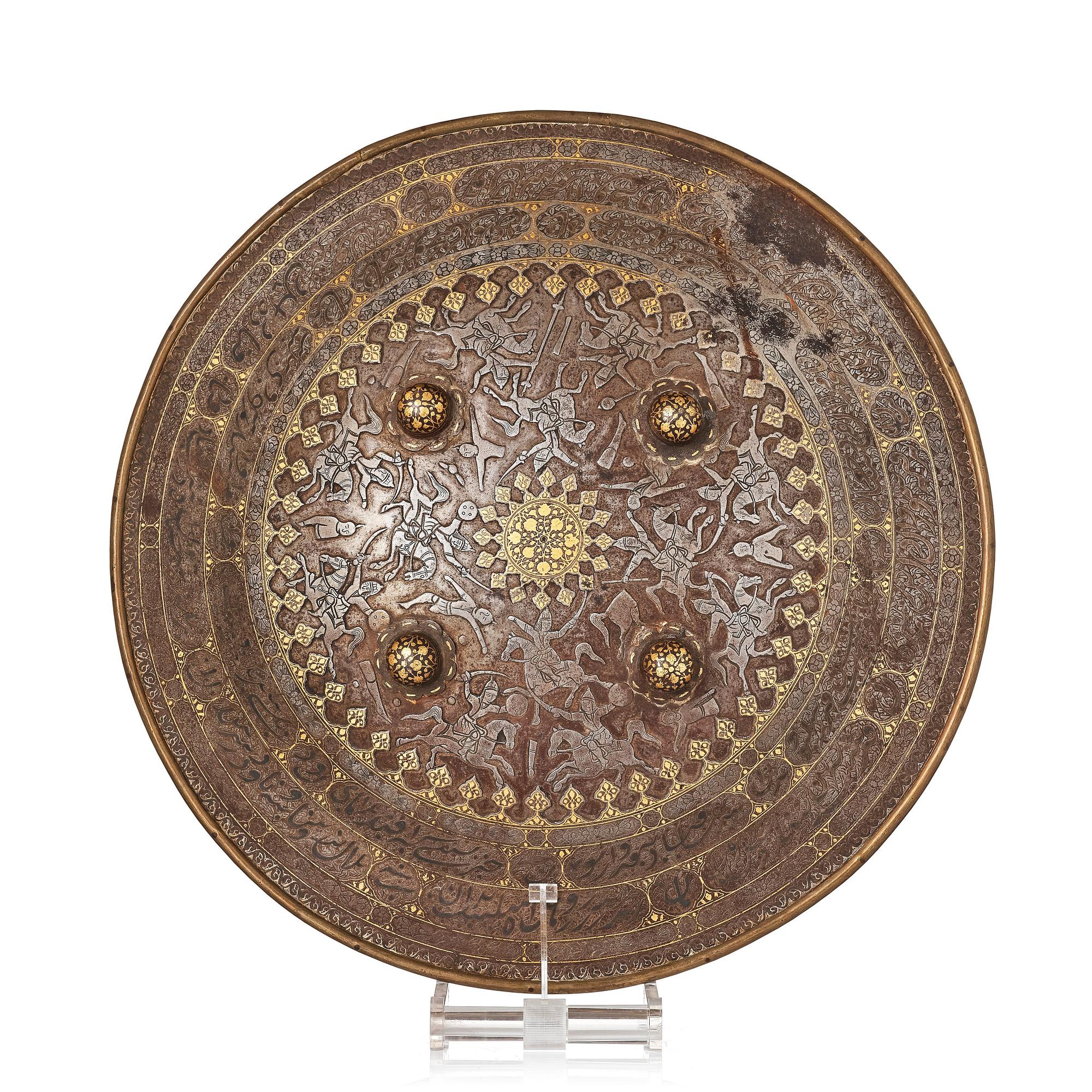 A gold-damascened steel shield, Qajar Iran, 19th century.