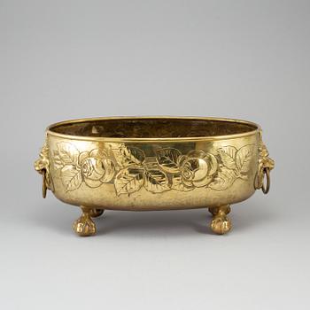 A 19th century brass flower pot.