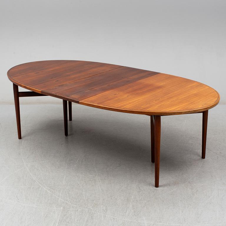 ARNE VODDER, a Danish rosewood veneered dining table, 1960's.