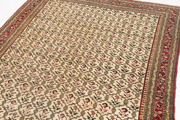 An antique Agra carpet Of Mughal 'Shrub' design, northern India, c. 270 x 180 cm.
