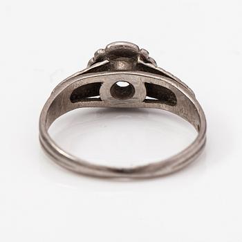 A Tillander, a palladium ring with a ca. 0.23 ct diamond. Helsinki.