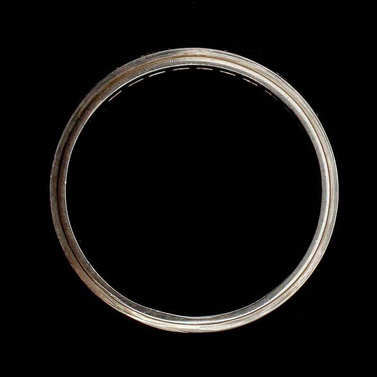 RING, 18 k vitguld, med små briljanter 0.17 ct enligt gravyr. Vikt ca 4 g.